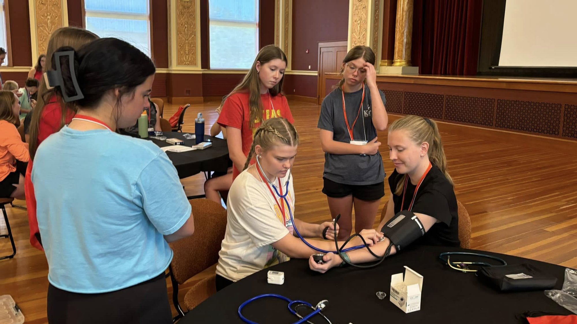 Rural Health Careers Camp students learn to take vital signs.